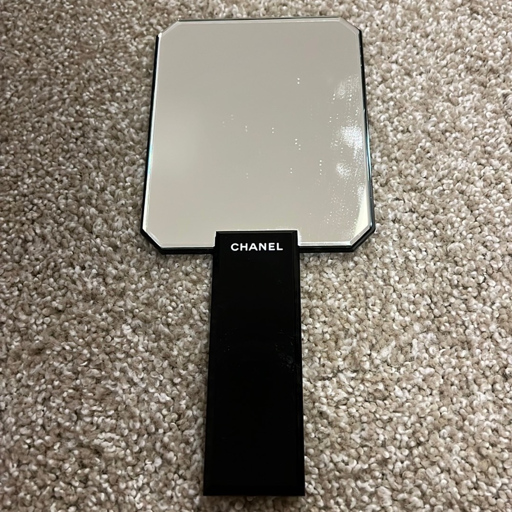 Authentic Chanel handheld mirror with suede cover pouch